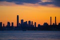 Silhouette of the Lower Manhattan Skyline on the East River in New York City during Sunset Royalty Free Stock Photo