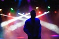 silhouette of male dancer in a night club