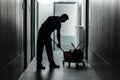 Male Janitor Cleaning Corridor Royalty Free Stock Photo