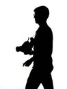 Silhouette of a photographer on a white background