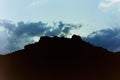 Silhouette at Machu Piccu of man arms raised on top of mountain Royalty Free Stock Photo