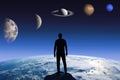 Silhouette of a man on background of the Earth and different planets. Elements of this image furnished by NASA Royalty Free Stock Photo