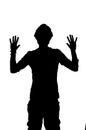 Silhouette of a man being robbed with hands up