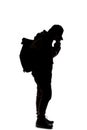 Silhouette of a Man Checking His Cell Phone Royalty Free Stock Photo