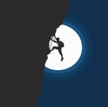silhouette of a man climbing a mountain against the backdrop of the night sky and moon Royalty Free Stock Photo