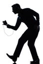 Silhouette man dancing listening to music Royalty Free Stock Photo