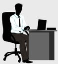 Silhouette man at the Desk with laptop Royalty Free Stock Photo