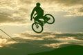 Silhouette of a man doing a jump with a bmx bike Royalty Free Stock Photo