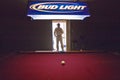 Silhouette of a man in the doorway of a pool hall in Lima Montana Royalty Free Stock Photo