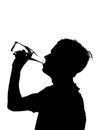 Silhouette of a man drinking