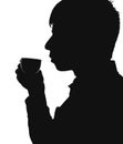 Silhouette of a man drinking coffee