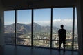 Silhouette of man enjoying view from Gran Torre Santiago