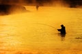 Silhouette of Man Flyfishing in River Royalty Free Stock Photo