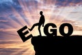 Silhouette of a man gets rid of the ego as a bad habit