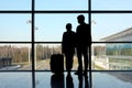 Silhouette of man and girl standing near window Royalty Free Stock Photo