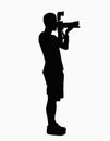 Silhouette of man holding camera. Royalty Free Stock Photo