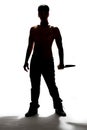 Silhouette of a man holding knife Royalty Free Stock Photo