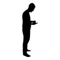 Silhouette man holding smartphone phone playing tablet male using communication tool idea looking phone addiction concept