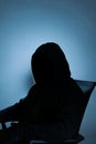 a silhouette of a man with hoodie