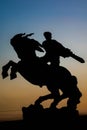 Silhouette of man on horse statue. Man riding horse statue. Monument of man with war horse. Monument of Sasuntsi Davit in Yerevan
