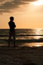 Silhouette Man Looking Out at Beach During Sunset Royalty Free Stock Photo