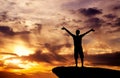 Silhouette of a man on a mountain top Royalty Free Stock Photo