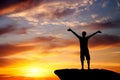 Silhouette of a man on a mountain top Royalty Free Stock Photo