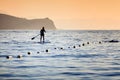 A man paddling on a paddleboard