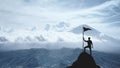 Silhouette of a man on the peak of a mountain, concept of victory and achievement Royalty Free Stock Photo