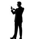 Silhouette man on the phone sms text messaging Royalty Free Stock Photo