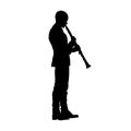 silhouette of man playing clarinet, clarinetist Royalty Free Stock Photo