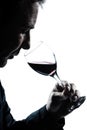 Silhouette man portrait smelling red wine glass Royalty Free Stock Photo