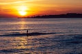 Silhouette of man practicing up paddle in Cascais, Portugal Royalty Free Stock Photo
