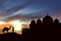 Silhouette man praying with camel outside the mosque Royalty Free Stock Photo