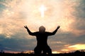 Silhouette man praying with cross Royalty Free Stock Photo