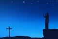 Silhouette of man praying to god with cross shape Royalty Free Stock Photo