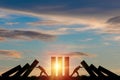 Silhouette man pushing rectangle block which falling to stop dominos others rectangle standing with blue sky. Risk and crisis