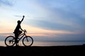 Silhouette of man riding bicycle Royalty Free Stock Photo