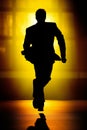 Silhouette of a Man running fast away Royalty Free Stock Photo