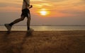 Silhouette of man running with sunrise or sunset background Royalty Free Stock Photo