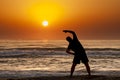 Silhouette Man Sea Sunrise Doing Fitness Exercise Royalty Free Stock Photo