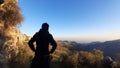 Silhouette of a man seeing the mountains Royalty Free Stock Photo