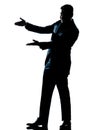 Silhouette man showing pointing empty copy space