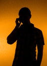 Silhouette of man speak over the phone Royalty Free Stock Photo