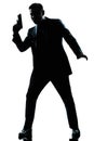Silhouette man spy holding gun Royalty Free Stock Photo