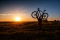 Silhouette of a man with a bicycle Royalty Free Stock Photo