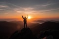 Silhouette Man standing and celebrating success and achievement on the top of mountain with sun rise, for Victory concept. Royalty Free Stock Photo