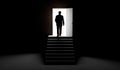 Silhouette of a man standing in front of an open door. Royalty Free Stock Photo