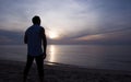 Silhouette Man stands at Sunrise Royalty Free Stock Photo