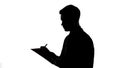 Silhouette of man in suit holding folder, writing survey results, questionnaire